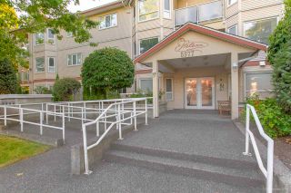 Photo 1: 201 5977 177B Street in Surrey: Cloverdale BC Condo for sale in "The Stetson" (Cloverdale)  : MLS®# R2521208