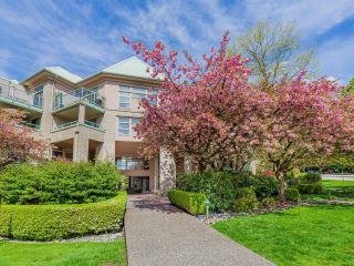 Photo 1: 411A 301 MAUDE Road in Port Moody: North Shore Pt Moody Condo for sale in "HERITAGE GRAND" : MLS®# R2776511