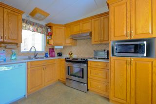 Photo 16: 18 8670 156 Street in Surrey: Fleetwood Tynehead Manufactured Home for sale : MLS®# R2680437