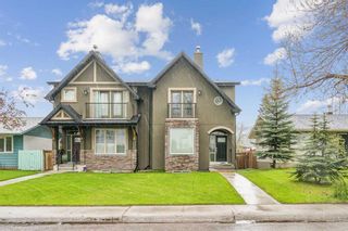 Main Photo: 2427 52 Avenue SW in Calgary: North Glenmore Park Semi Detached (Half Duplex) for sale : MLS®# A2134039