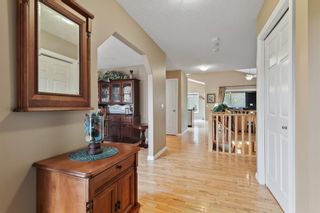 Photo 5: 128 Shawnee Way SW in Calgary: Shawnee Slopes Detached for sale : MLS®# A1259334