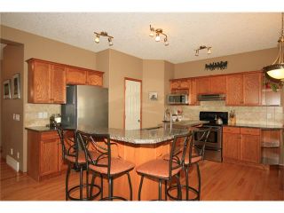 Photo 9: 18 WEST POINTE Manor: Cochrane House for sale : MLS®# C4072318