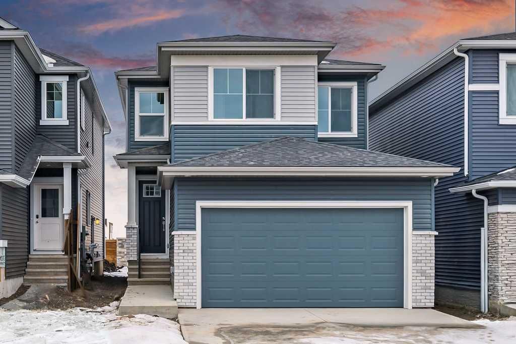 Main Photo: 130 Creekstone Path SW in Calgary: C-168 Detached for sale : MLS®# A2104625