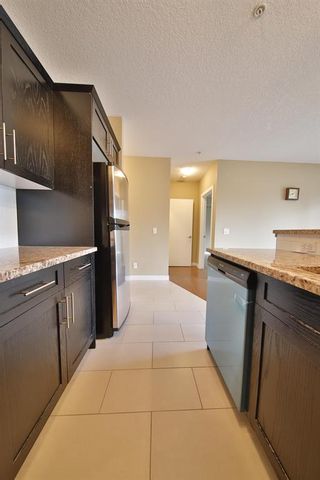 Photo 12: 203 117 19 Avenue NE in Calgary: Tuxedo Park Apartment for sale : MLS®# A2004116