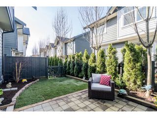 Photo 26: 15 7665 209 Street in Langley: Willoughby Heights Townhouse for sale in "ARCHSTONE-YORKSON" : MLS®# R2561969