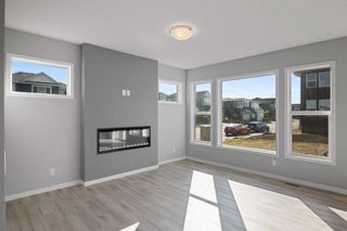 Photo 5: 97 Creekside Avenue SW in Calgary: C-168 Detached for sale : MLS®# A2085252