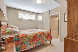 Photo 32: 215 Rocky Ridge Villas NW in Calgary: Rocky Ridge Duplex for sale : MLS®# A1256179