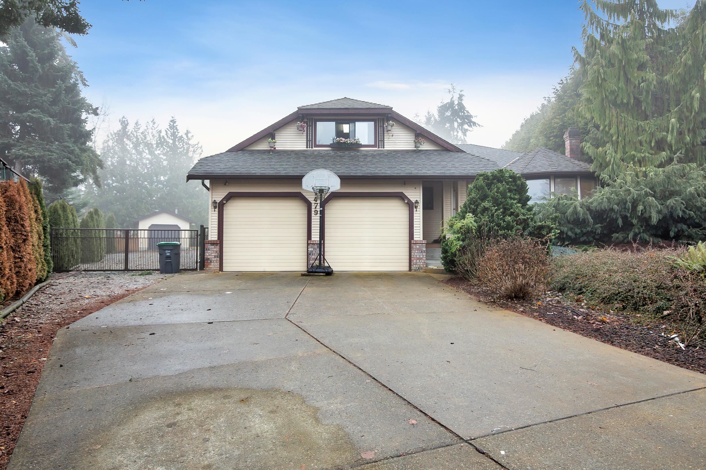 Main Photo: 7479 149A Street in Surrey: East Newton House for sale : MLS®# R2721744