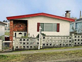 Photo 1: 5566 Chester Street in Vancouver: Fraser VE House for sale (Vancouver East)  : MLS®# V992863