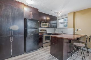 Photo 2: 103 1333 13 Avenue SW in Calgary: Beltline Apartment for sale : MLS®# A2054284