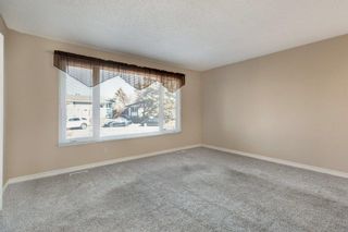 Photo 3: 148 Queen Anne Way SE in Calgary: Queensland Detached for sale : MLS®# A2040152