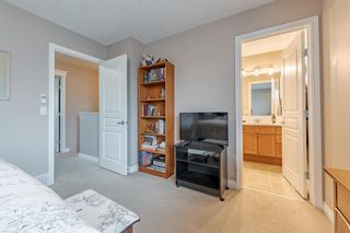 Photo 19: 29 Crystal Shores Cove: Okotoks Row/Townhouse for sale : MLS®# A2019169