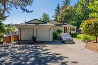 Photo 1: 34386 FRASER Street in Abbotsford: Central Abbotsford House for sale : MLS®# R2751068