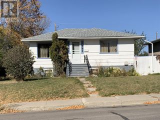 Photo 1: 1703 2B Avenue N in Lethbridge: House for sale : MLS®# A2115271