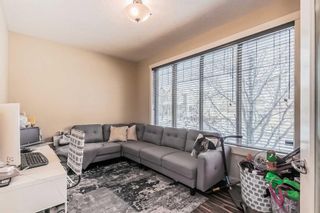 Photo 19: 128 Mike Ralph Way SW in Calgary: Garrison Green Detached for sale : MLS®# A2112996