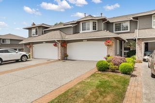 Photo 1: 6119 W BOUNDARY Drive in Surrey: Panorama Ridge Townhouse for sale in "Lakewood Gardens" : MLS®# R2725303