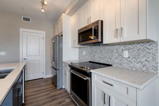 Photo 26: 310 100 Auburn Meadows Common SE in Calgary: Auburn Bay Apartment for sale : MLS®# A2002985
