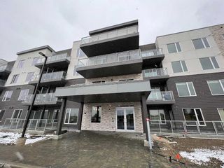Main Photo: 412 200 Shawnee Square SW in Calgary: Shawnee Slopes Apartment for sale : MLS®# A2119079