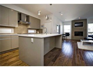 Photo 3: 2048 47 Avenue SW in CALGARY: Altadore River Park Residential Attached for sale (Calgary)  : MLS®# C3529079