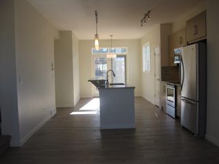 Photo 18: 373 Walden Drive SE in Calgary: Walden Row/Townhouse for sale : MLS®# A1257318
