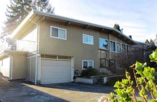 Photo 2: 590 BERRY Street in Coquitlam: Central Coquitlam House for sale : MLS®# R2692848