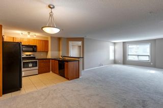 Main Photo: 1324 60 Panatella Street NW in Calgary: Panorama Hills Apartment for sale : MLS®# A1212939