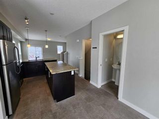 Photo 9: 17 Redstone Circle NE in Calgary: Redstone Row/Townhouse for sale : MLS®# A2130894