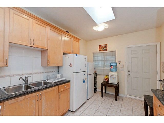 Photo 10: Photos: 7778 Main Street in Vancouver: South Vancouver 1/2 Duplex for sale (Vancouver East)  : MLS®# V1095210