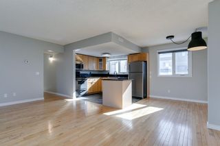 Photo 7: 1015 1540 29 Street NW in Calgary: St Andrews Heights Row/Townhouse for sale : MLS®# A1209846