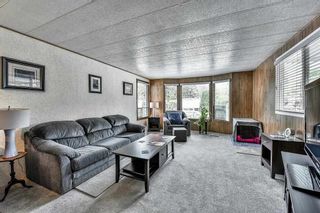 Photo 2: 100 8560 156 Street in Surrey: Fleetwood Tynehead Manufactured Home for sale in "WESTVILLA ESTATES" : MLS®# R2075304