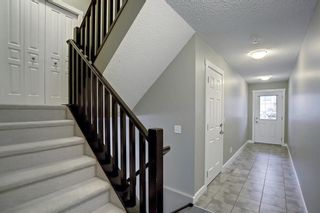 Photo 3: 17 28 Heritage Drive: Cochrane Row/Townhouse for sale : MLS®# A1167650