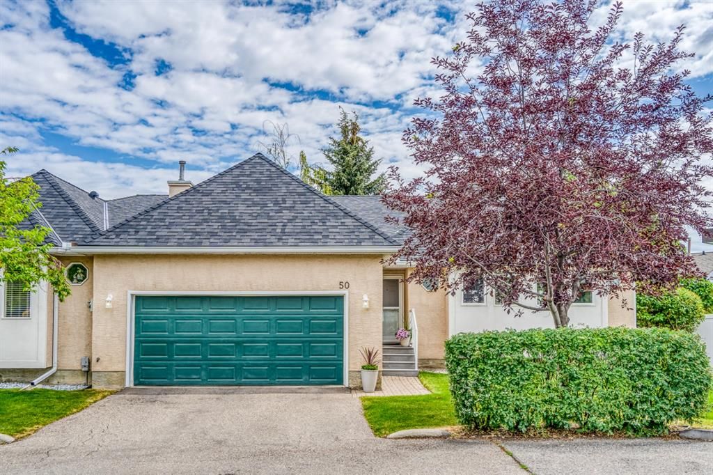 Main Photo: 50 Candle Terrace SW in Calgary: Canyon Meadows Semi Detached (Half Duplex) for sale : MLS®# A2026815