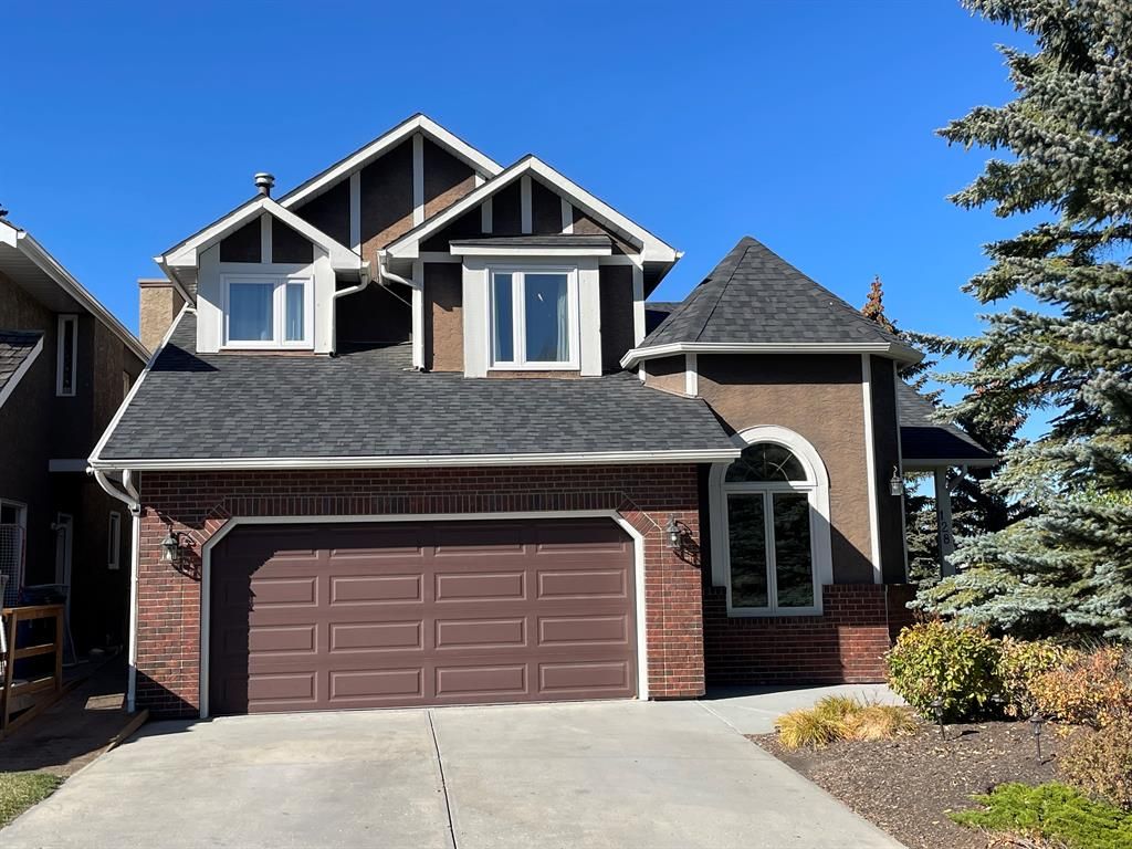 Main Photo: 128 Strathaven Circle SW in Calgary: Strathcona Park Detached for sale : MLS®# A2028641