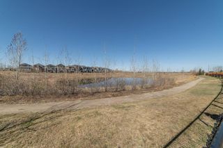 Photo 31: 115 Auburn Meadows Place SE in Calgary: Auburn Bay Semi Detached for sale : MLS®# A1092634