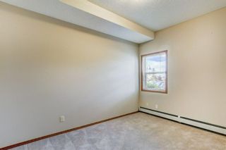 Photo 23: 103 72 Quigley Drive: Cochrane Apartment for sale : MLS®# A1149156