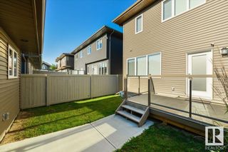 Photo 39: 3133 KESWICK Way in Edmonton: Zone 56 House Half Duplex for sale : MLS®# E4309053