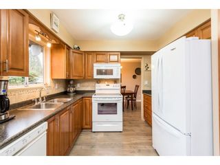 Photo 8: 1027 SADDLE Street in Coquitlam: Ranch Park House for sale in "RANCH PARK" : MLS®# R2250981