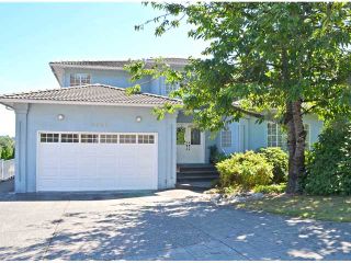 Photo 1: 2907 KALAMALKA Drive in Coquitlam: Coquitlam East House for sale in "RIVER HEIGHTS" : MLS®# V1136807