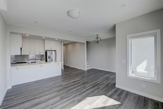 Photo 11: 908 Crestridge Common SW in Calgary: Crestmont Row/Townhouse for sale : MLS®# A2030391