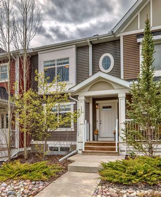 Photo 1: 135 Sunset Road: Cochrane Row/Townhouse for sale : MLS®# A2134624