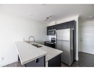 Photo 5: 412 30515 CARDINAL Avenue in Abbotsford: Abbotsford West Condo for sale in "Tamarind Westside" : MLS®# R2803481