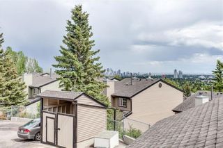 Photo 41: 14 448 Strathcona Drive SW in Calgary: Strathcona Park Row/Townhouse for sale : MLS®# A1221433