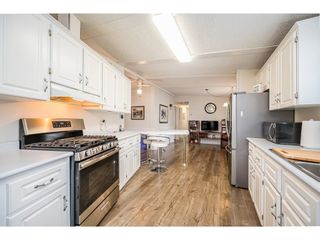 Photo 10: 17 8670 156 Street in Surrey: Fleetwood Tynehead Manufactured Home for sale in "WESTWOOD COURT" : MLS®# R2612269