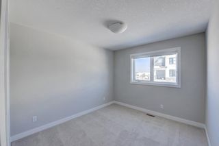 Photo 26: 908 Crestridge Common SW in Calgary: Crestmont Row/Townhouse for sale : MLS®# A2030391