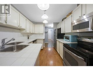 Photo 6: 983 Bernard Avenue Unit# 107 in Kelowna: House for sale : MLS®# 10309317