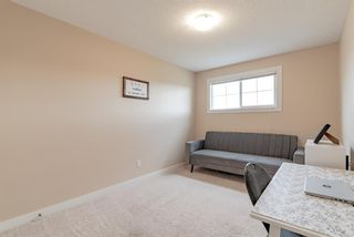 Photo 21: 1009 Evanston Square NW in Calgary: Evanston Row/Townhouse for sale : MLS®# A1213582