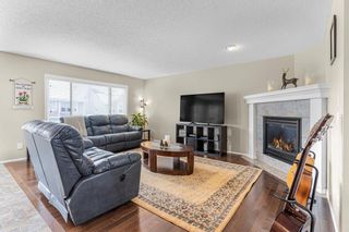 Photo 2: 322 River Heights Drive: Cochrane Detached for sale : MLS®# A2036564