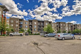 Photo 3: 8301 403 Mackenzie Way SW: Airdrie Apartment for sale : MLS®# A2051421
