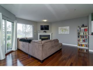 Photo 2: 105 5489 201 Street in Langley: Langley City Condo for sale in "CANIM COURT" : MLS®# R2127133