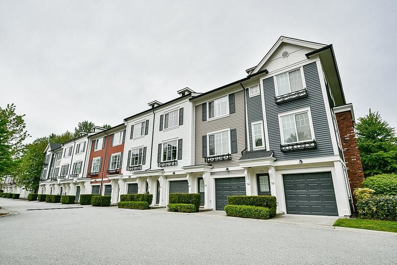 Main Photo: 50 3010 RIVERBEND Drive in Coquitlam: Coquitlam East Townhouse for sale : MLS®# R2696798